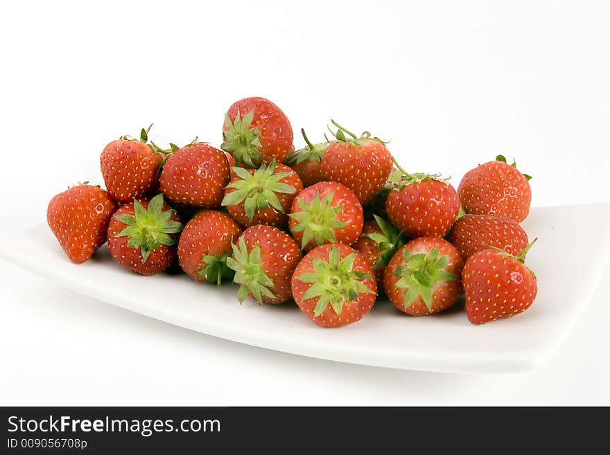 Ripe Strawberry's shot against a plain background.