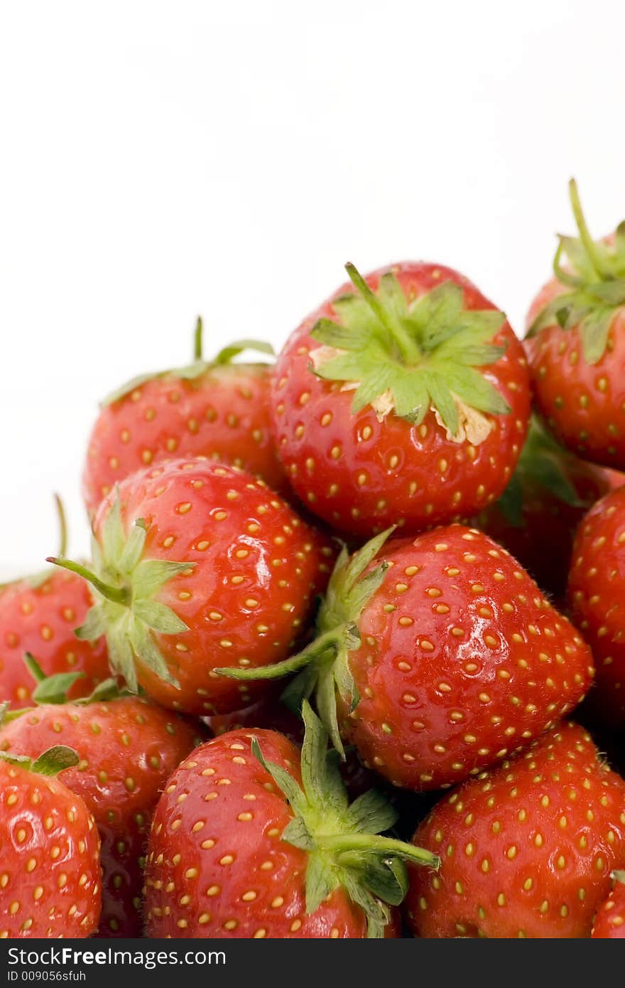 Ripe Strawberry's shot against a plain background.