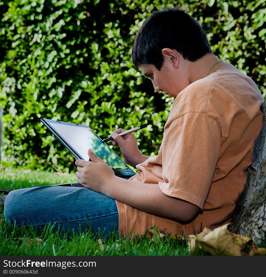 Student with his new touch pad laptop