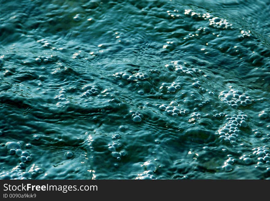 Photo of blue water waves. Photo of blue water waves