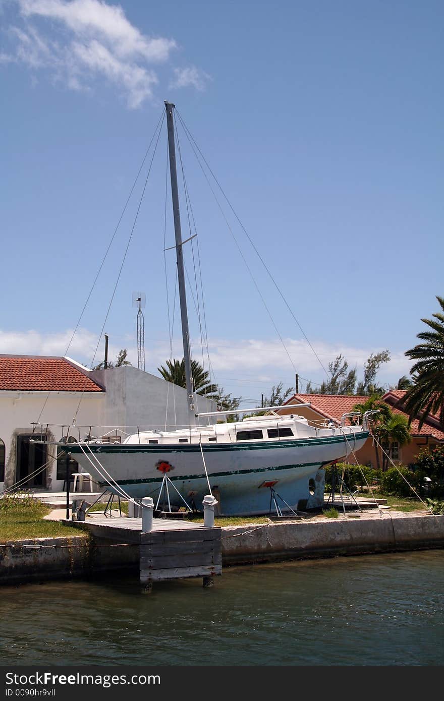 Damaged Storm Boat on Shore