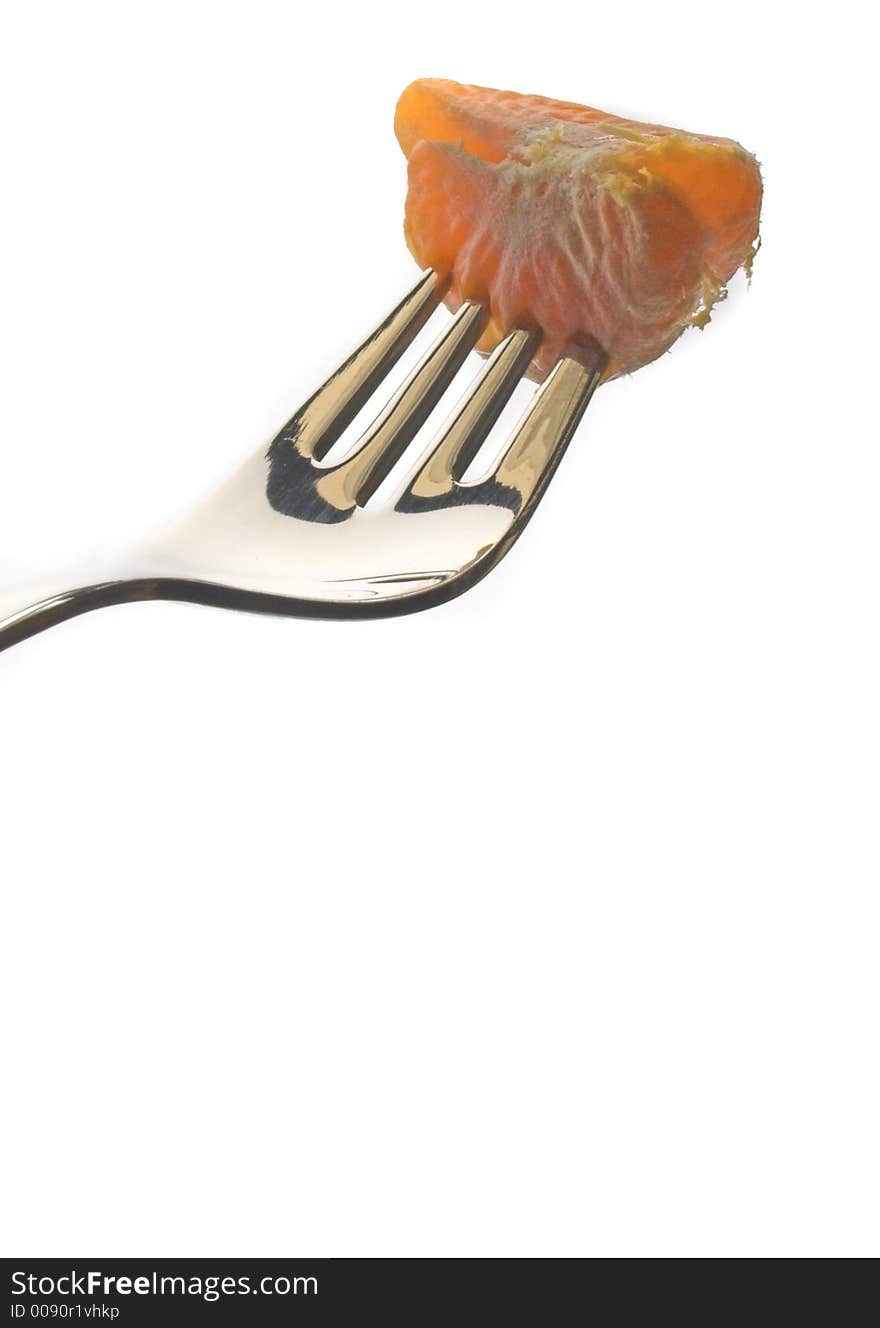 Fork with orange isolated in a white background