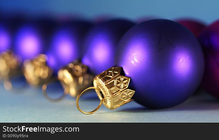 Blue  christmas ball on the blue background