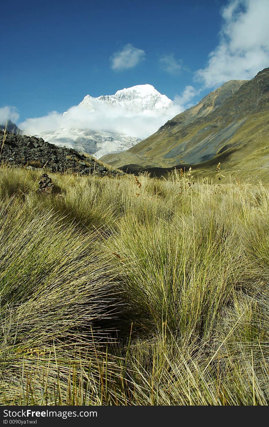 Snowcowered high cordillera mountain and grassland. Snowcowered high cordillera mountain and grassland