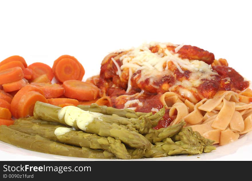 Baked Chicken with Marinara Sauce, Cheese and  Wheat Pasta with Carrots and Asparagus. Baked Chicken with Marinara Sauce, Cheese and  Wheat Pasta with Carrots and Asparagus