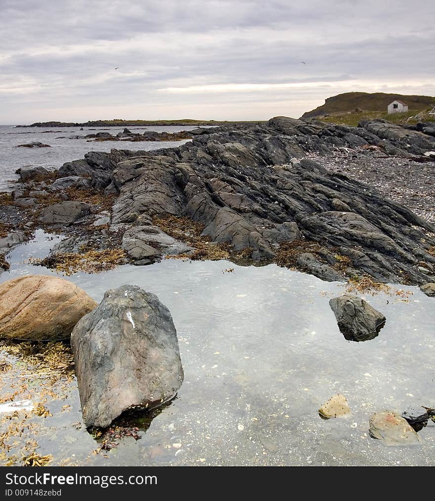 Coast with small cabin in New Founland,Canada