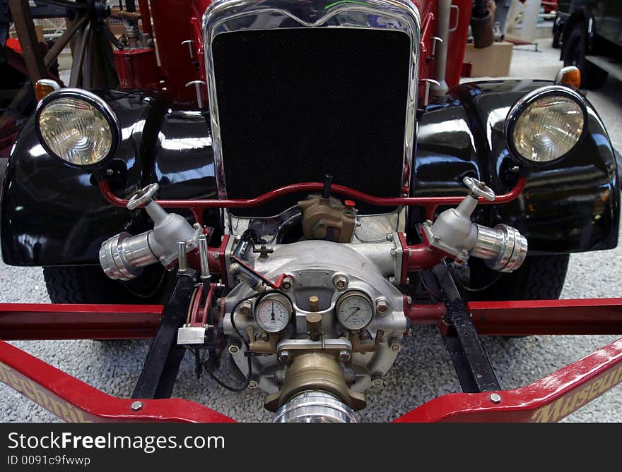 Detail front shot of an old fire truck. Detail front shot of an old fire truck