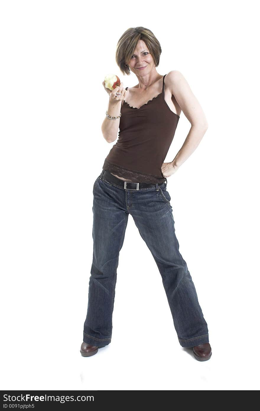 Woman eating an apple over white background