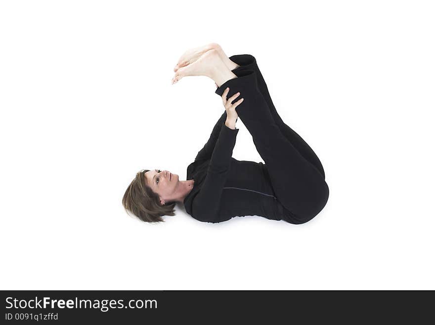 Woman doing yoga pose over white BG