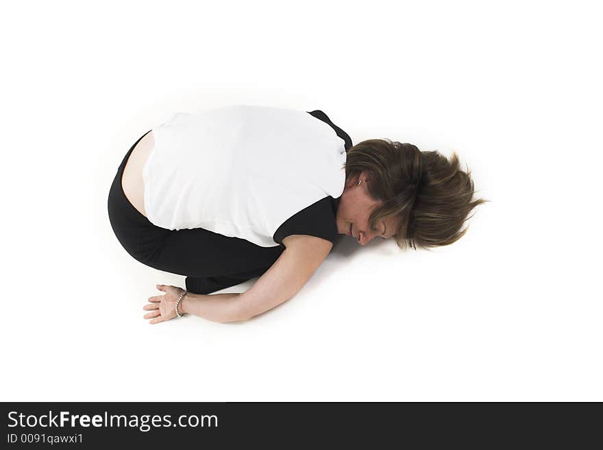 Woman in white t-shirt doing yoga