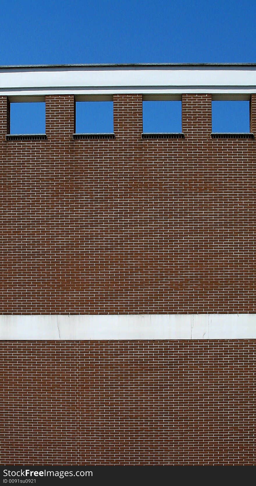 Brick wall with windows, Italy.