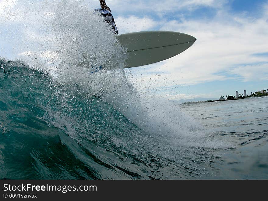 A young surfer getting air