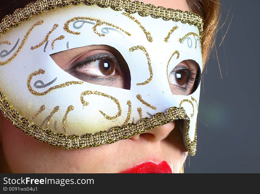 Brunette with mask closeup