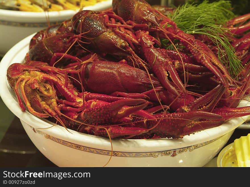 Bowl of boiled crayfish on a table. Bowl of boiled crayfish on a table