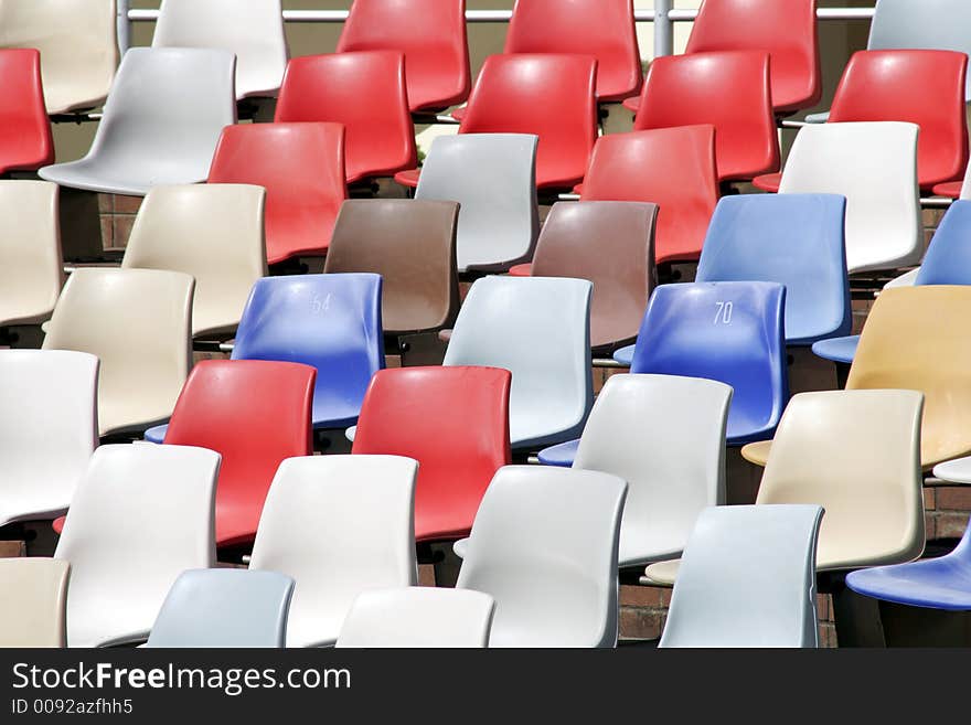 Colourful Empty Stadium Seats In Rows