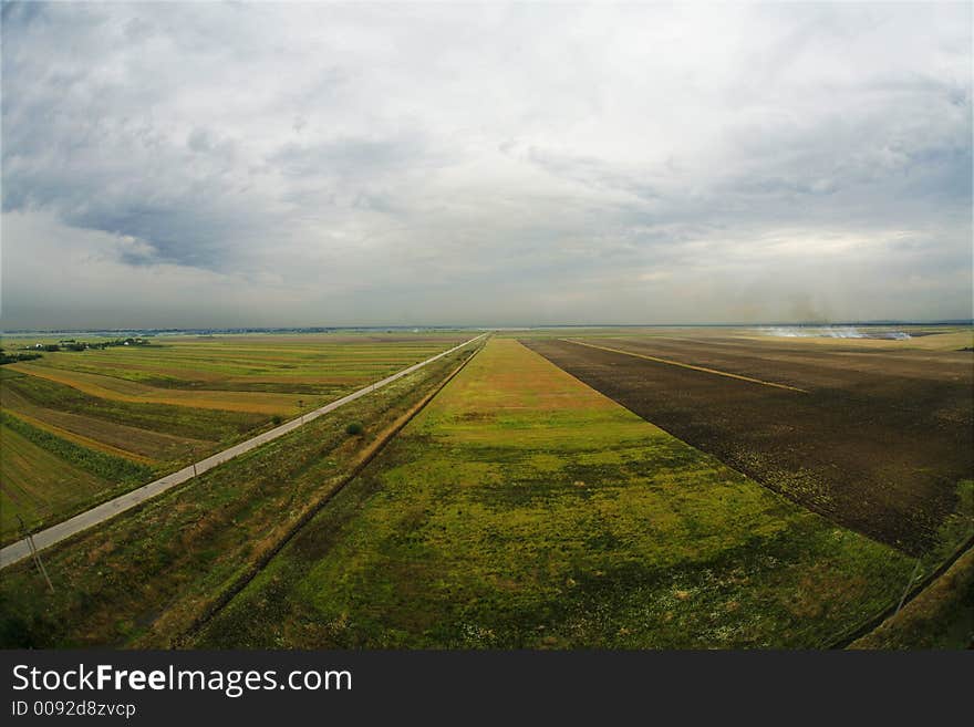 Birds eye view over a green field. Birds eye view over a green field