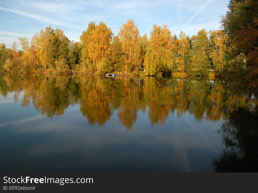 Autumn trees reflecting in a lake in bavaria. Autumn trees reflecting in a lake in bavaria