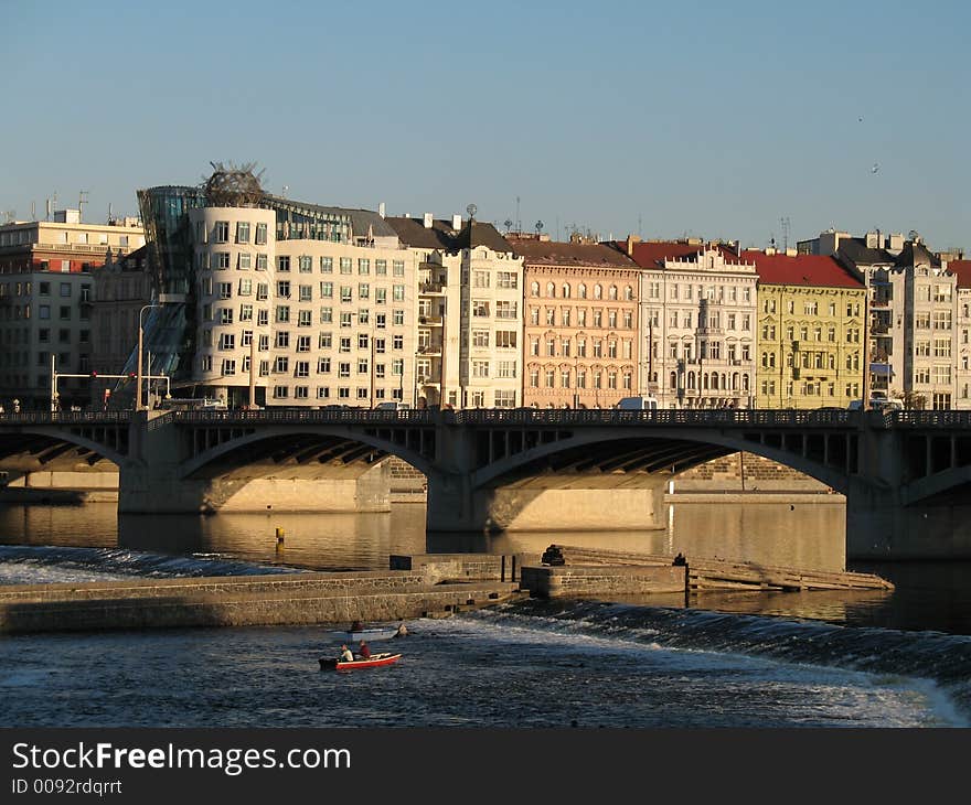 The Dancing house and other houses in Prague. The Dancing house and other houses in Prague