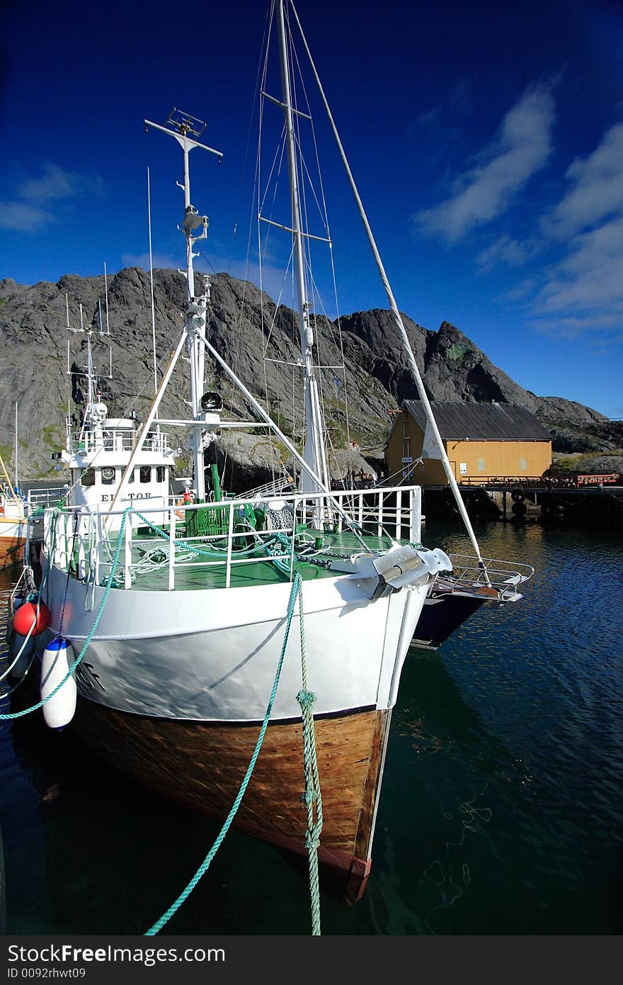 Begining of september at Nussfjord in the Lofoten Islands. Boats are quiet before winter (the season of fishing). Begining of september at Nussfjord in the Lofoten Islands. Boats are quiet before winter (the season of fishing)