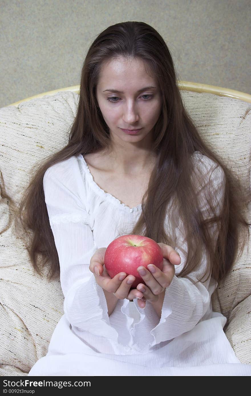 Pretty smiling woman with red apple. Portrait. Pretty smiling woman with red apple. Portrait.