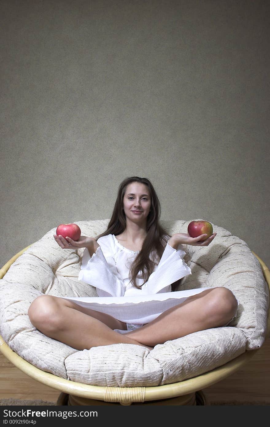 Pretty smiling woman with red apple. Portrait. Pretty smiling woman with red apple. Portrait.