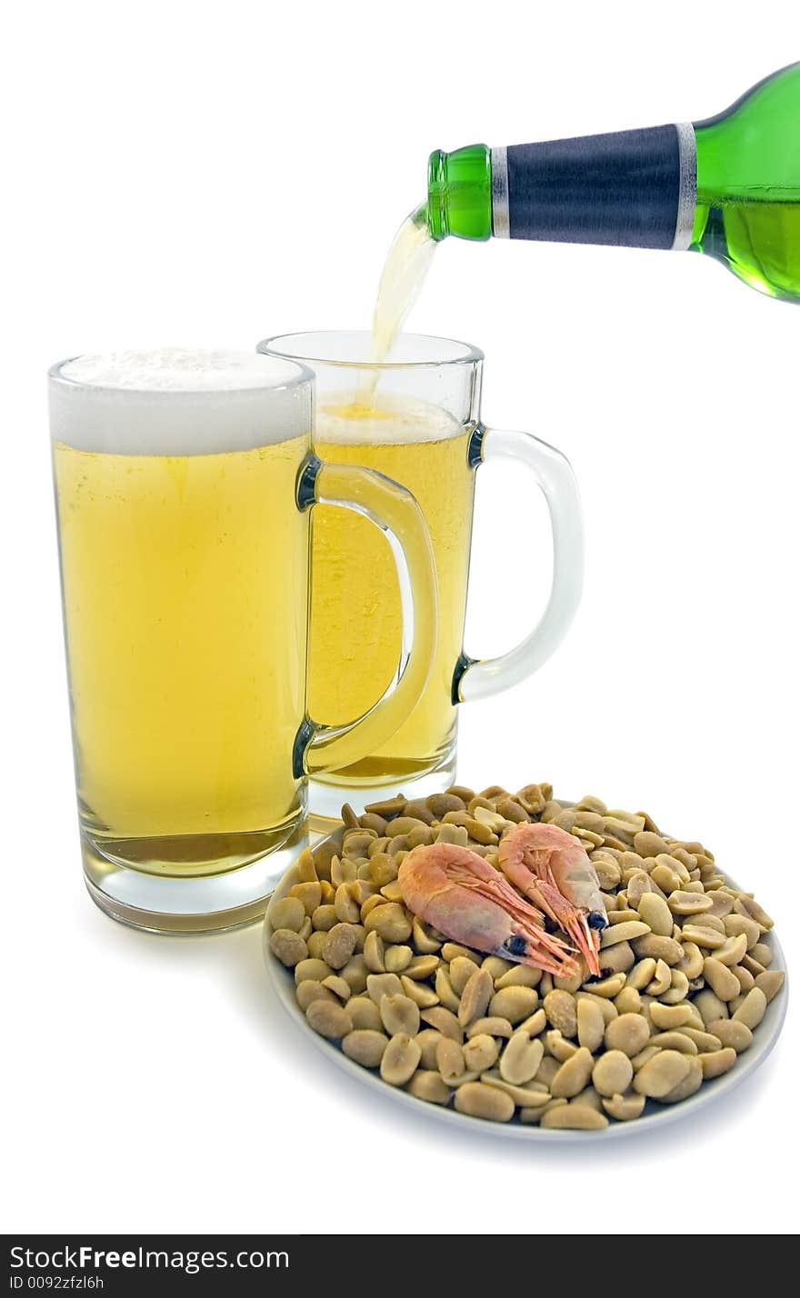 Two mugs of beer and plate with snacks. Clipping path included.