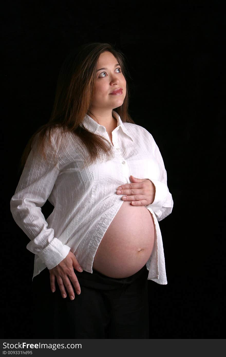 Woman looking right pregnant pensive. Woman looking right pregnant pensive