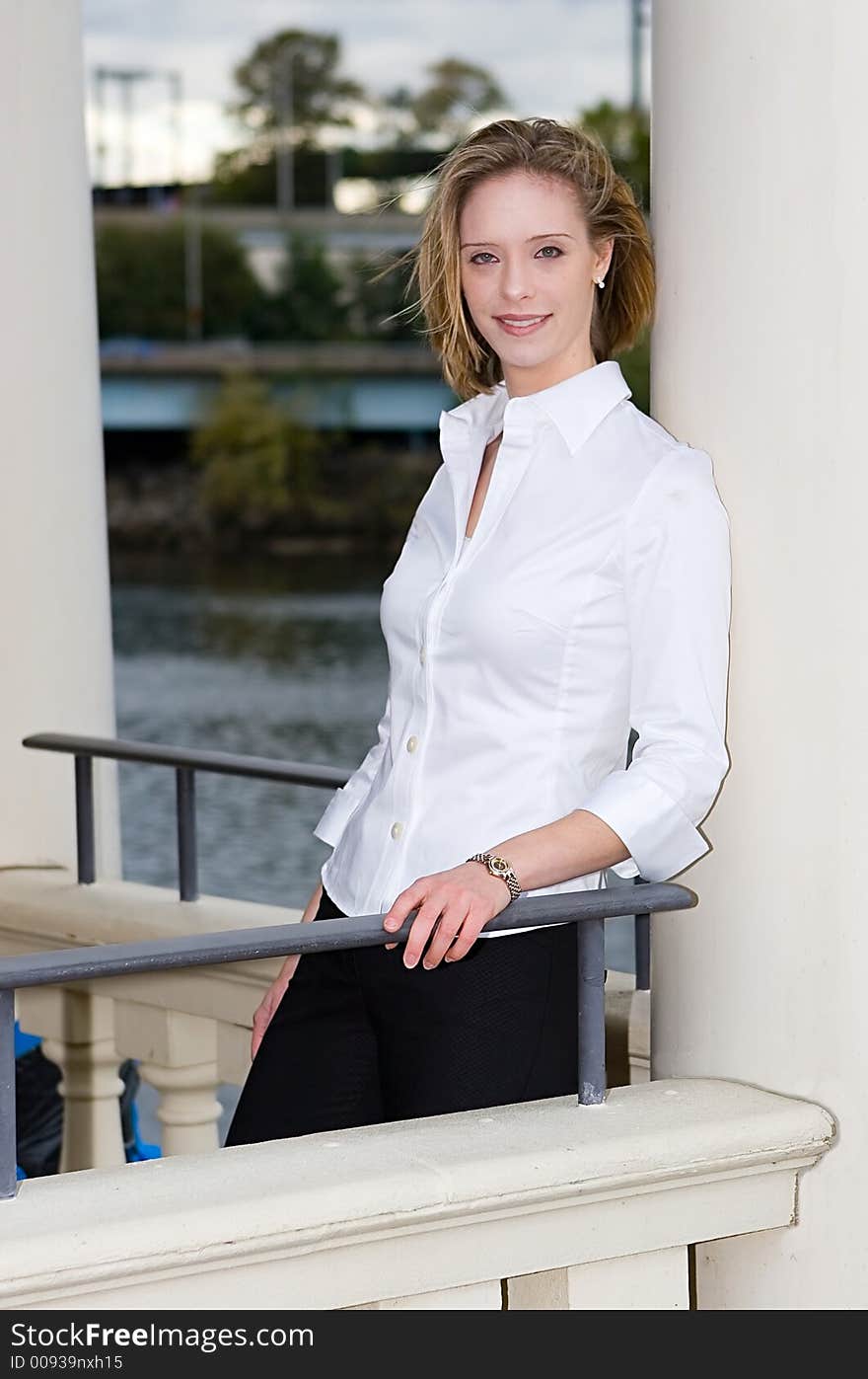 A young successful businesswomen posing outdoors. A young successful businesswomen posing outdoors.