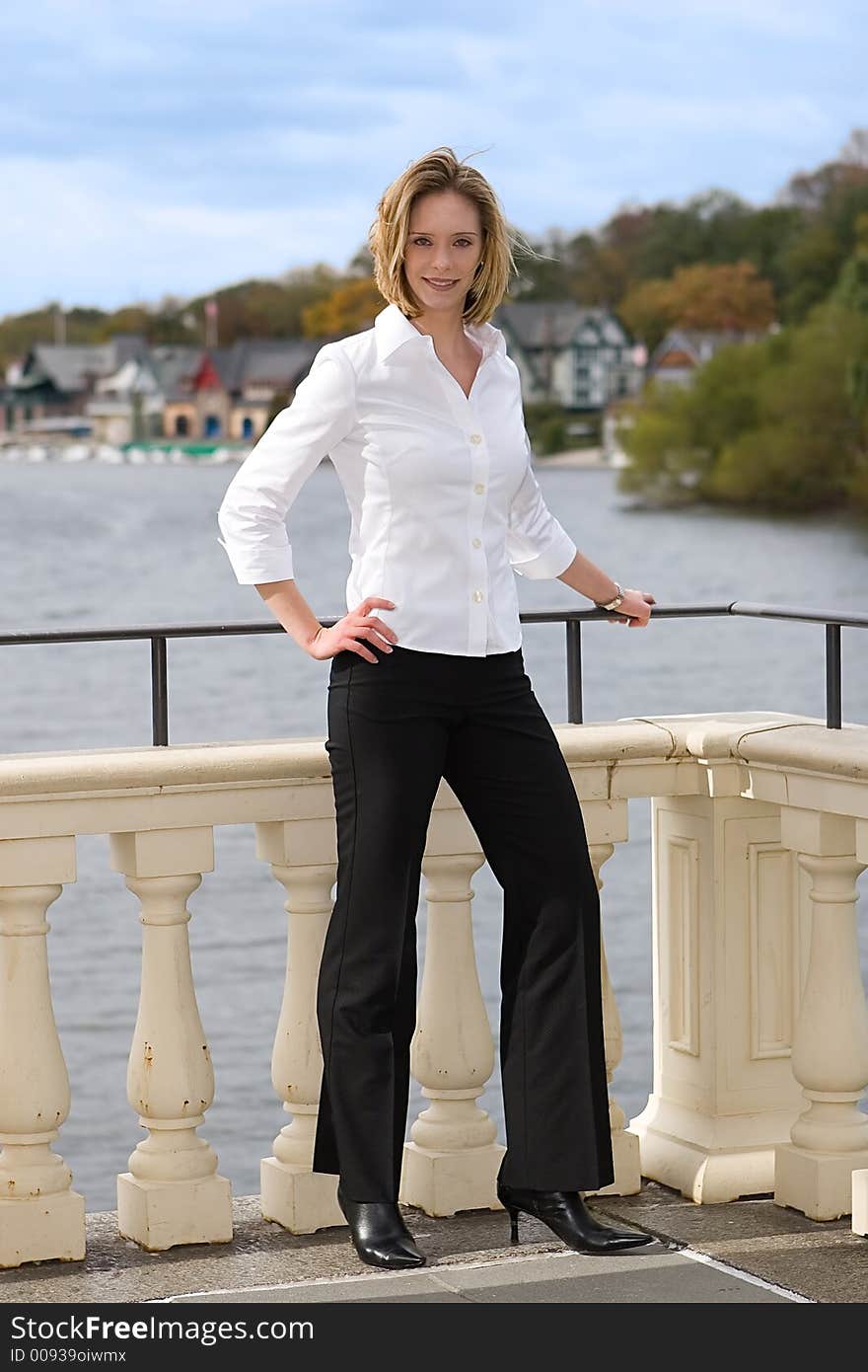 A young successful businesswomen posing outdoors. A young successful businesswomen posing outdoors.