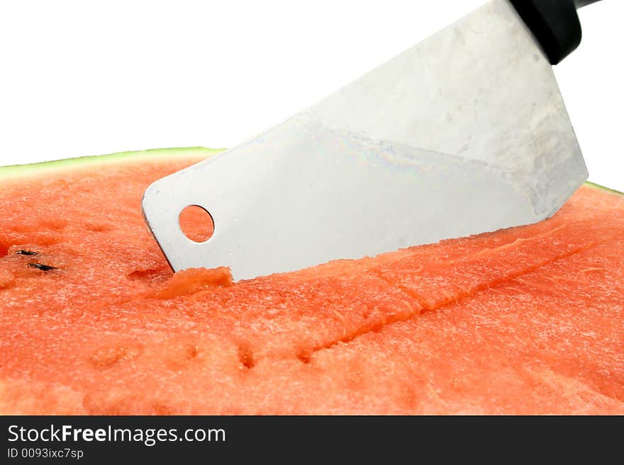 Cleaver cut into  juicy watermelon