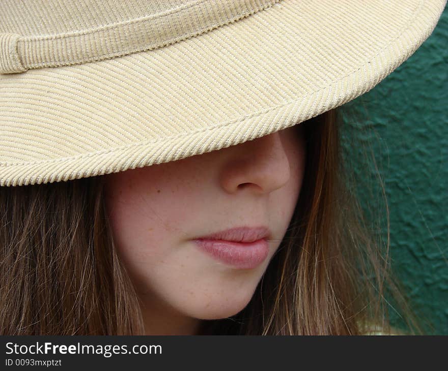 Young girl with a camel coloured hat. Young girl with a camel coloured hat.