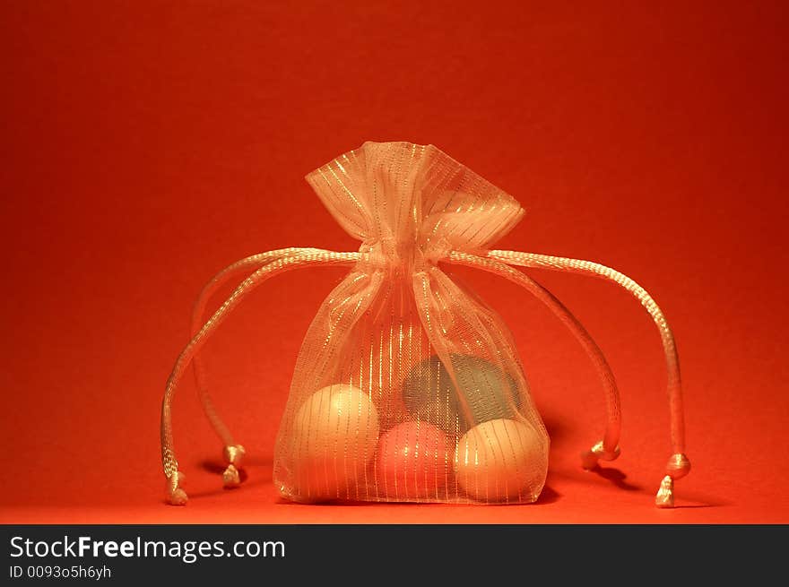 Colored candy in a beautiful bag. Colored candy in a beautiful bag