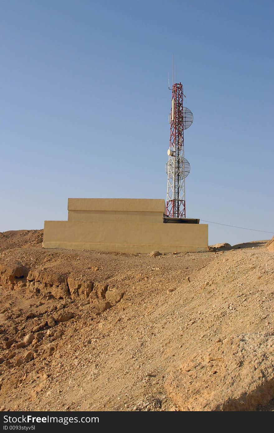 Tower GSM of communication in desert in mountains. Tower GSM of communication in desert in mountains