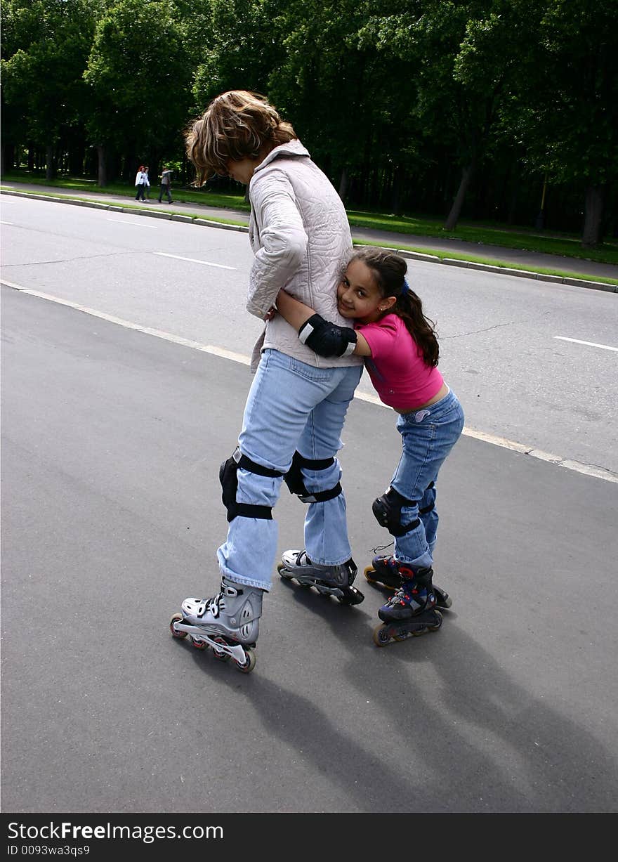 Mother and daughter on rollers.