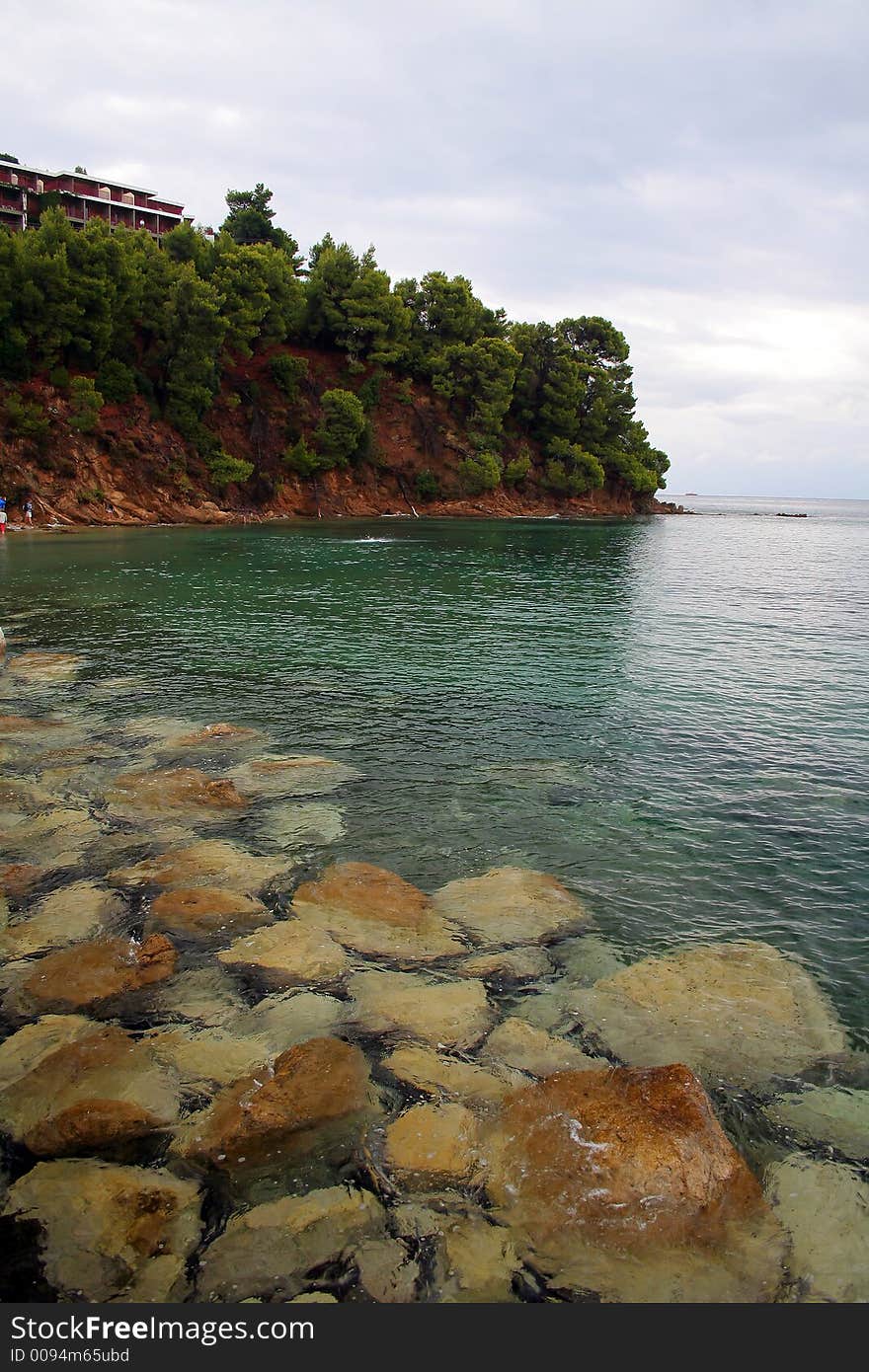 Clear water sea with stone and island