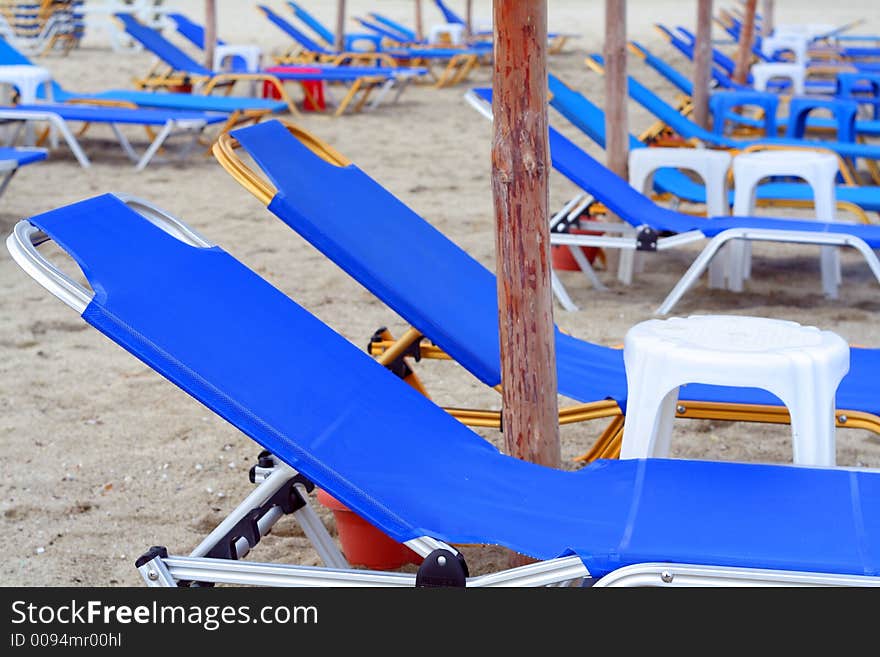 Sun loungers and beach umbrella. Sun loungers and beach umbrella