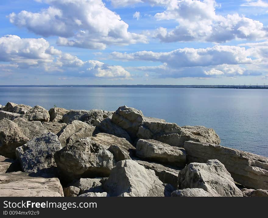 A rock wall on the lake Ontario. A rock wall on the lake Ontario.