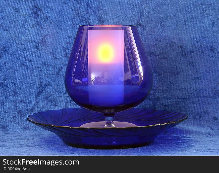 Blue Goblet, Plate, Blue background. Blue Goblet, Plate, Blue background