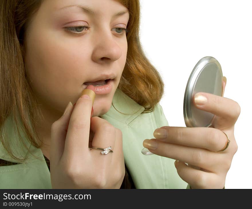 Girl and cosmetics (lipstick and mirror), isolated