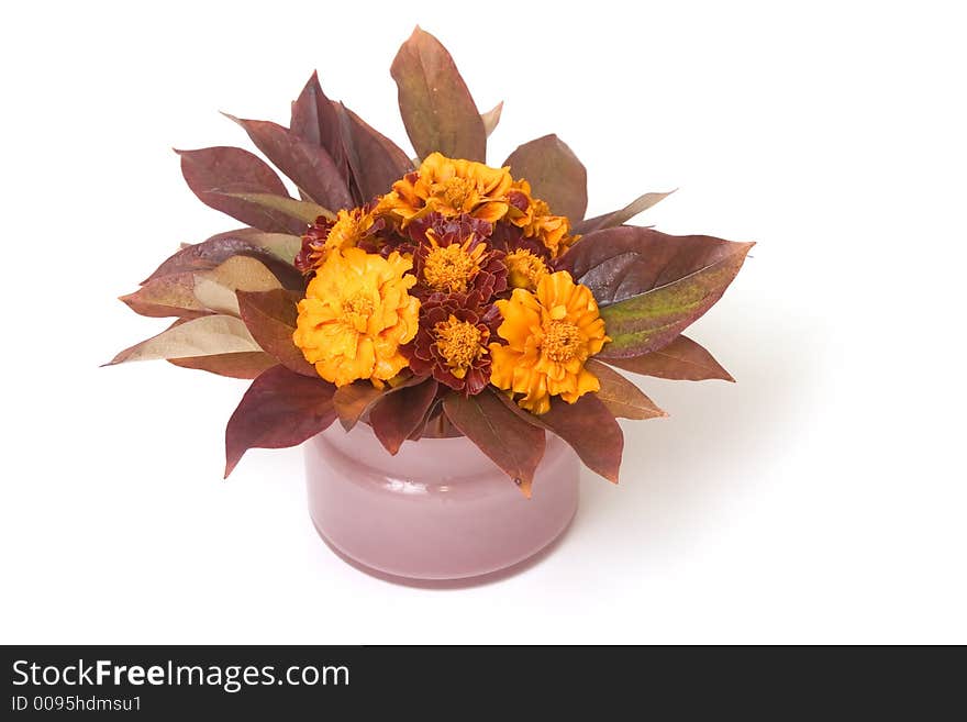 Composition of autumn flowers and leaves placed in ping pot. Composition of autumn flowers and leaves placed in ping pot