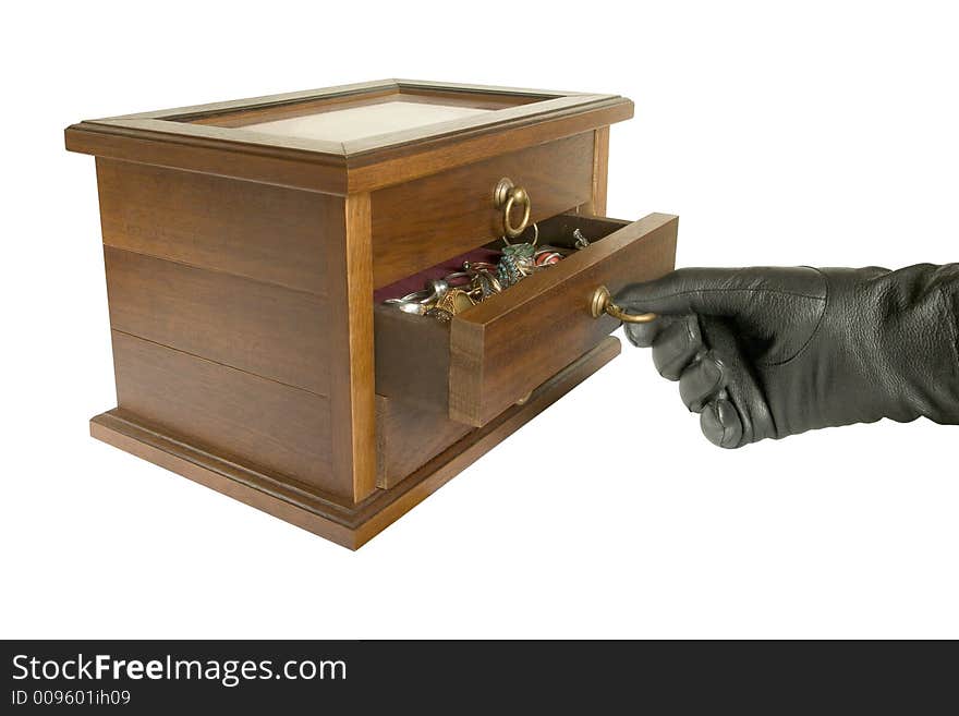 Hand In Black Glove Opening Casket With Jewelry