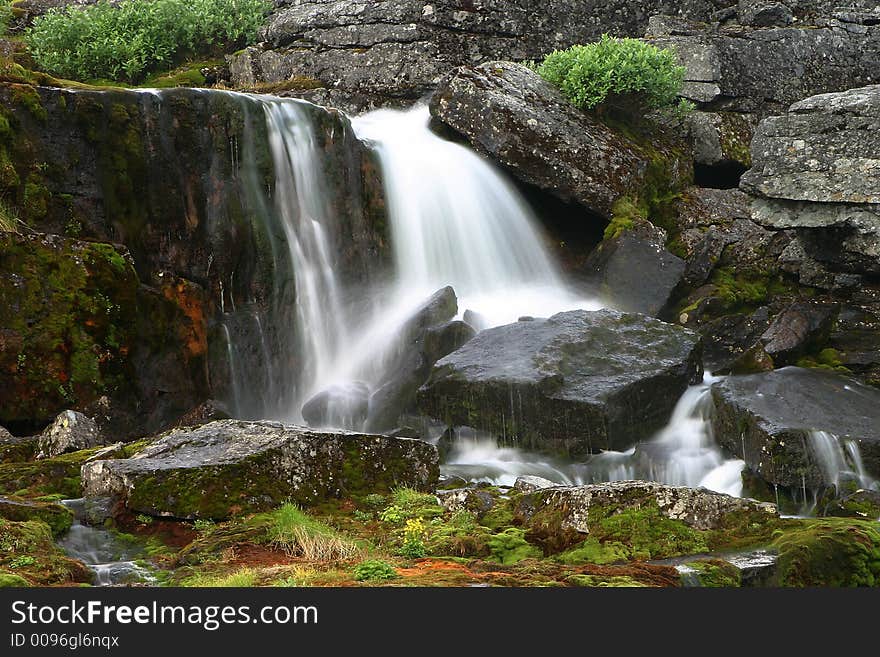 Rough mountain stream in northern mountains of the Europe. Rough mountain stream in northern mountains of the Europe