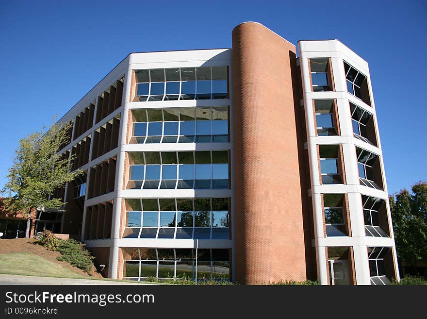 A Modern brick and glass city government building. A Modern brick and glass city government building