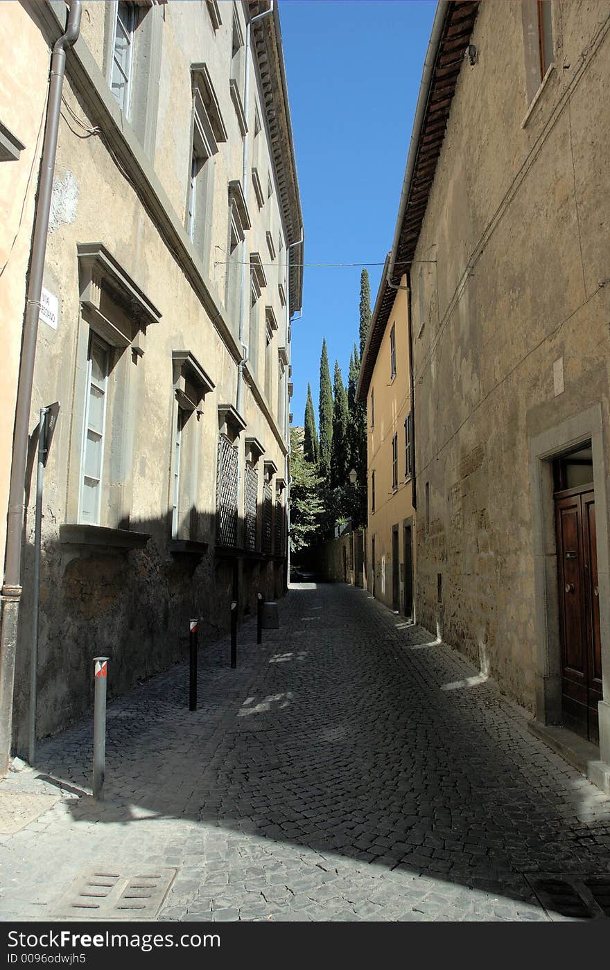 Medioeval narrow street with modern anti parking system in Orvieto Umbria