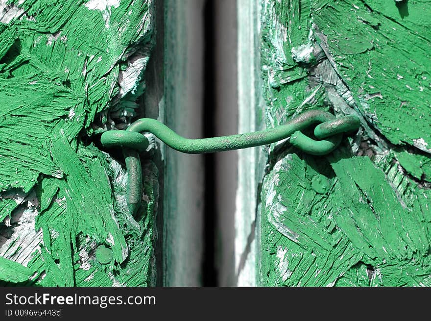 Hook and eye fastener with rustic door