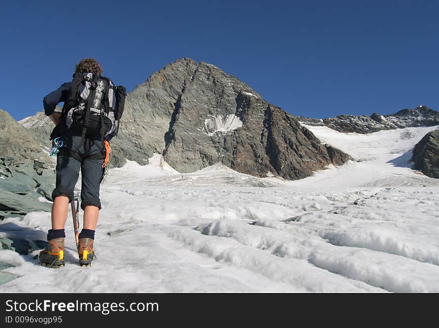 Climber on a mountain glacier. Climber on a mountain glacier