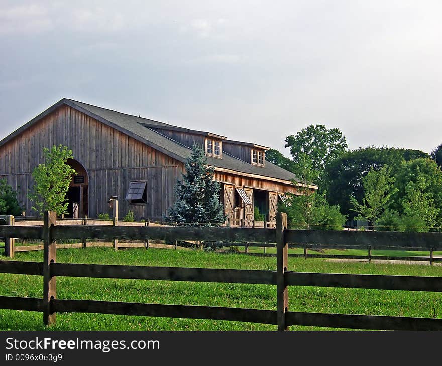 An old brown barn in the country in Pennsylvania. An old brown barn in the country in Pennsylvania.