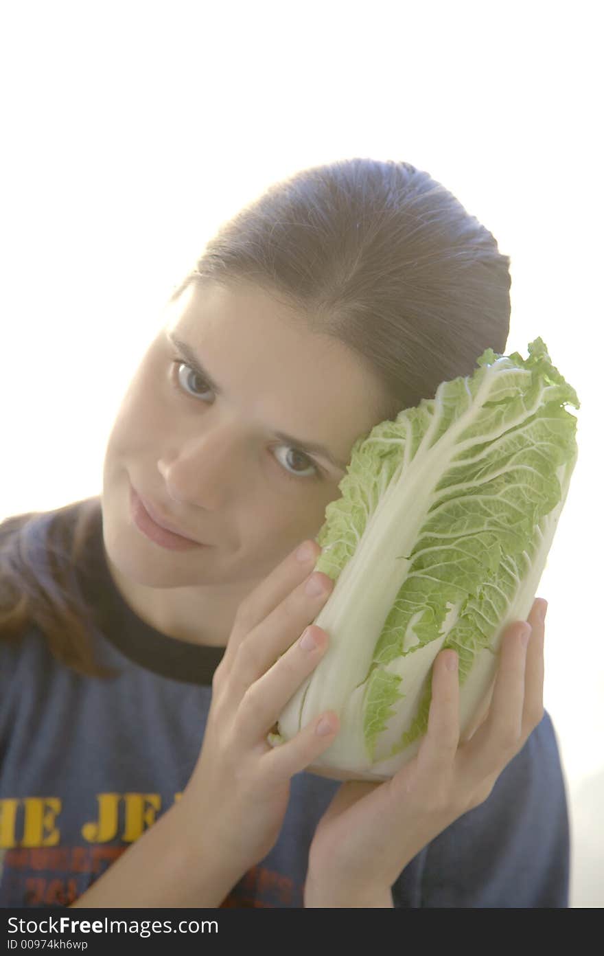 Pretty young woman with salad