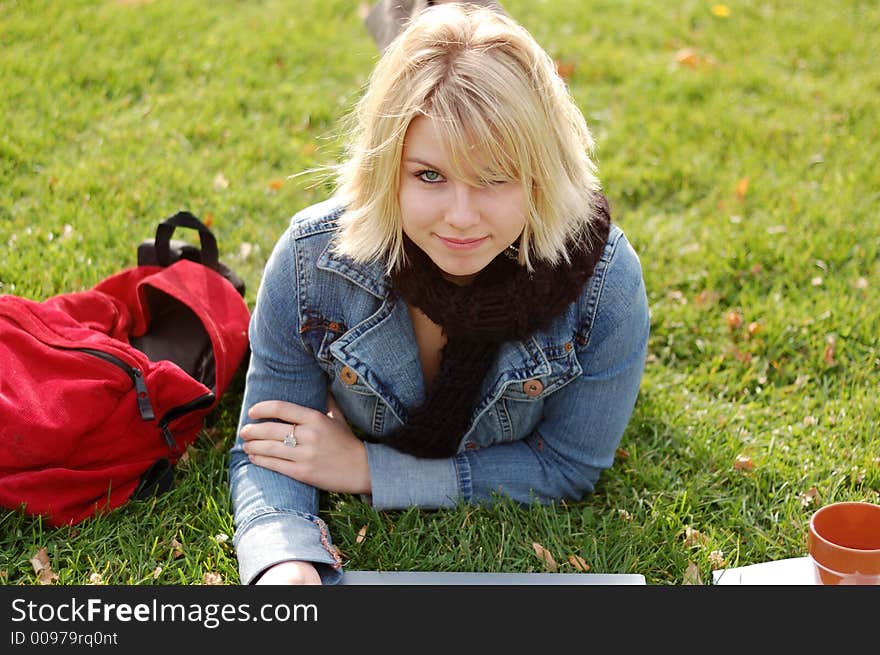 Beautiful woman outdoors with backpack.