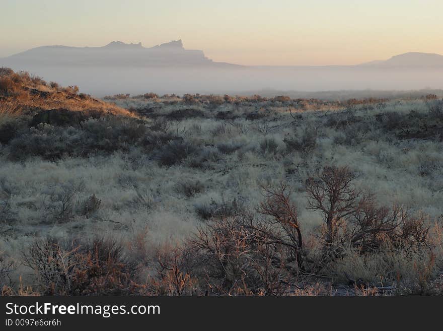 Sunrise scene at Lave Beds National Monument with The Plateau in the background